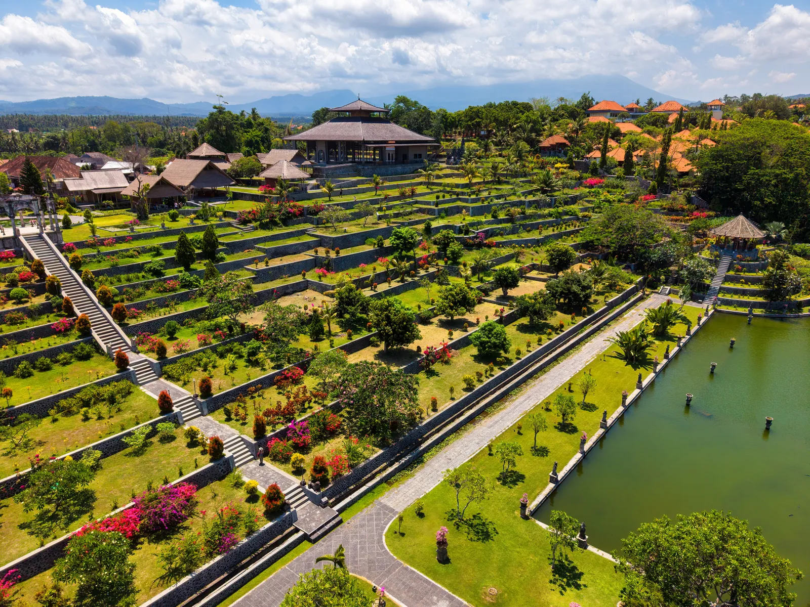 Aerial view of the terraced gardens and ponds of Tirta Gangga water palace in East Bali