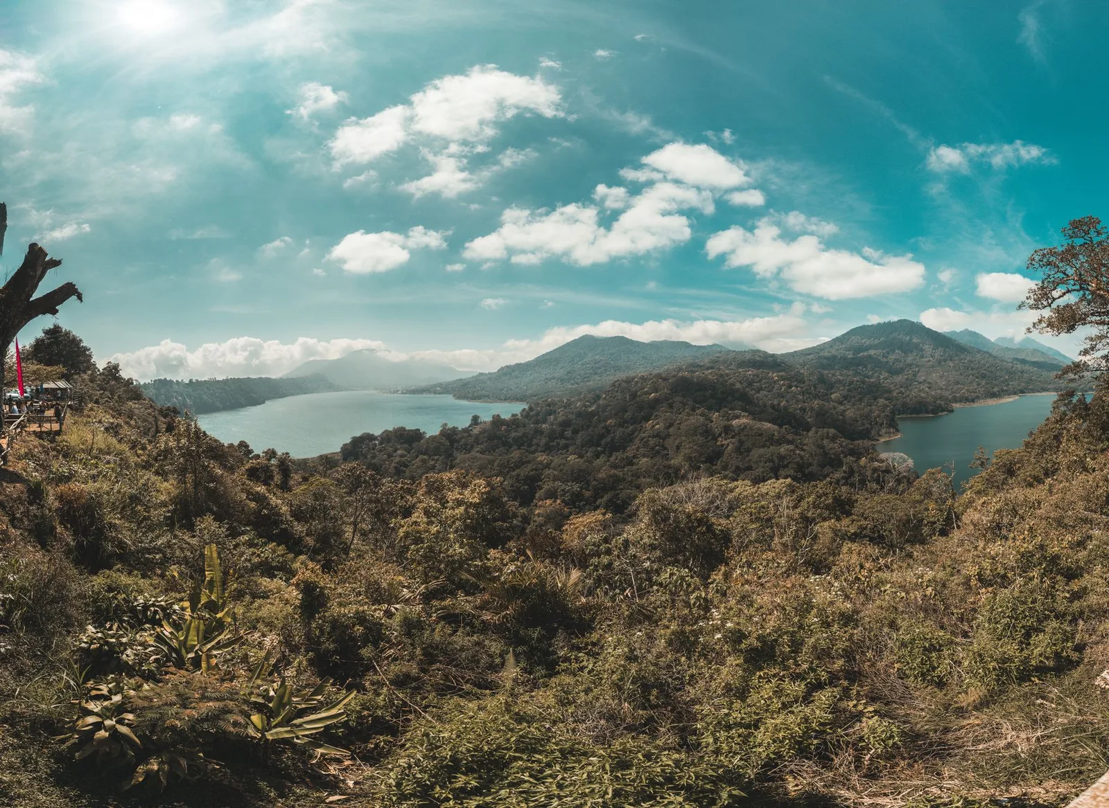 A view over forested hills and a lake in the Bali highlands