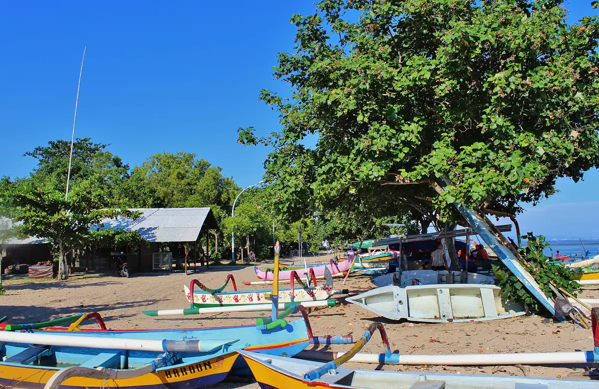 Fishing boats on the sand in morning light