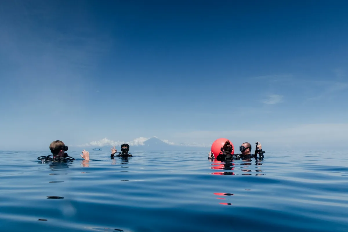 Divers at the surface before descending
