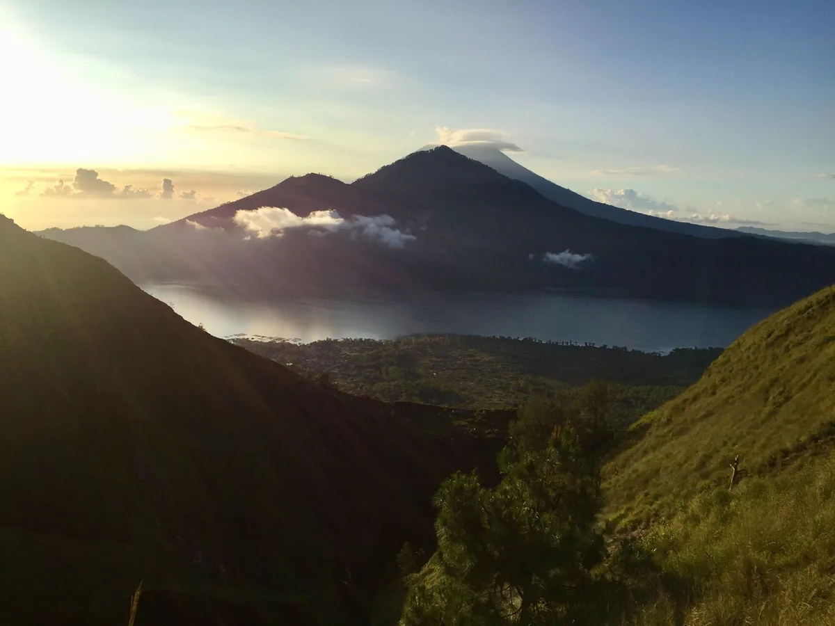 A caldera lake and mountain ridge in morning light
