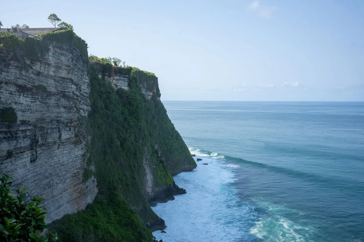Pale stone cliffs dropping into the sea