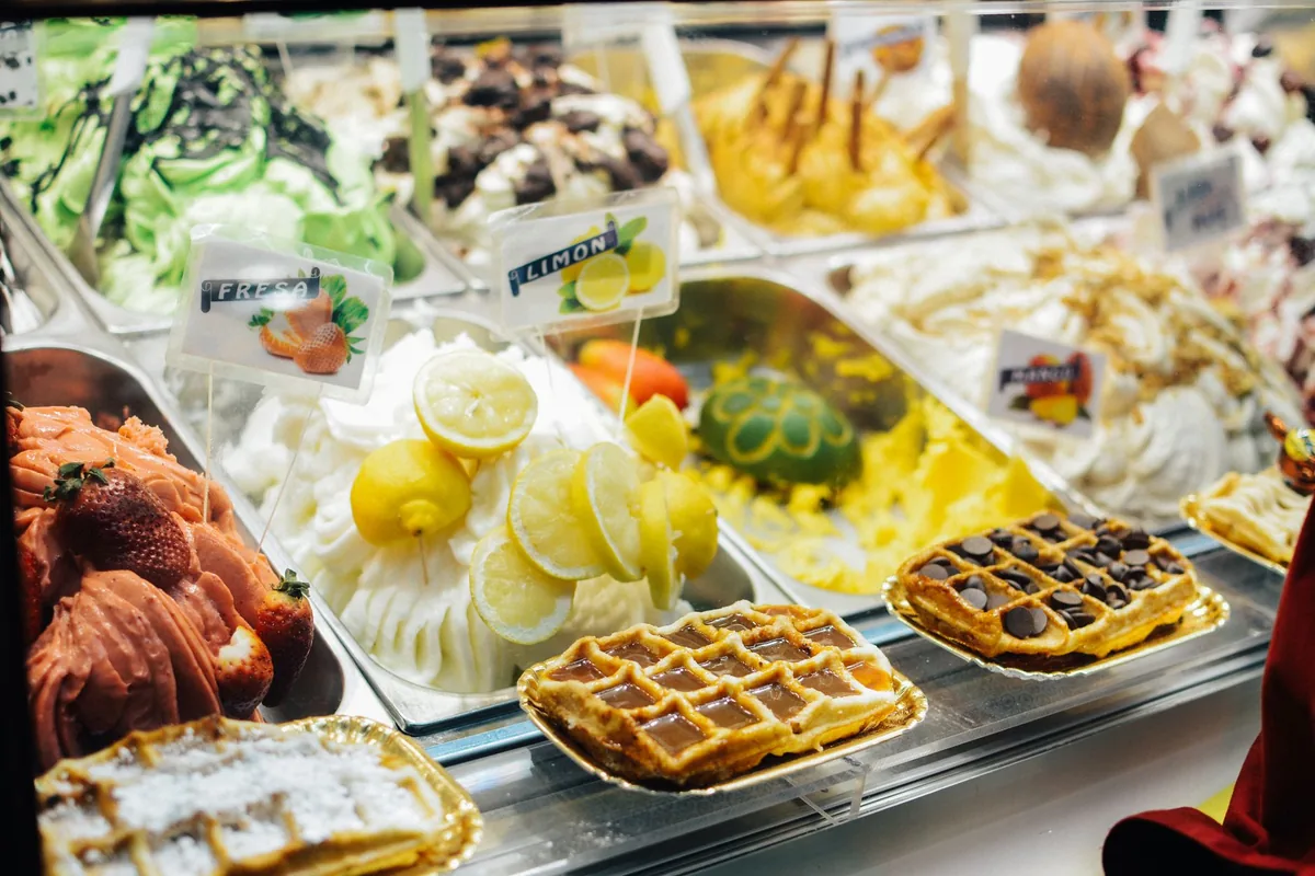 A display of brightly coloured gelato and waffles