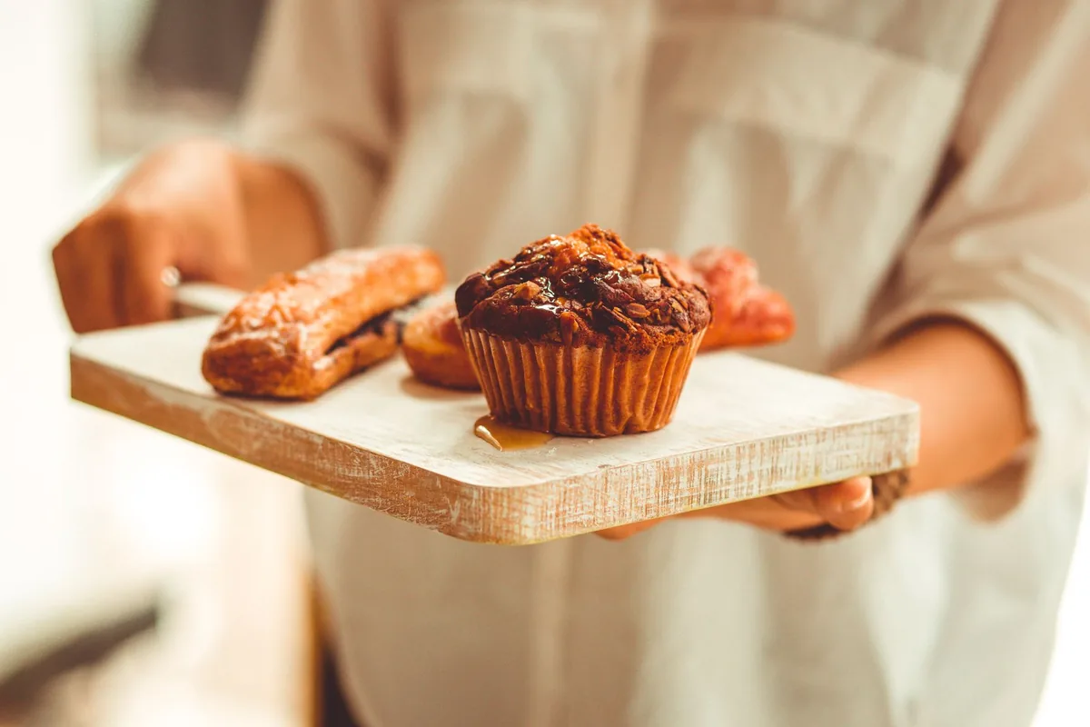 Freshly baked pastries on a serving board
