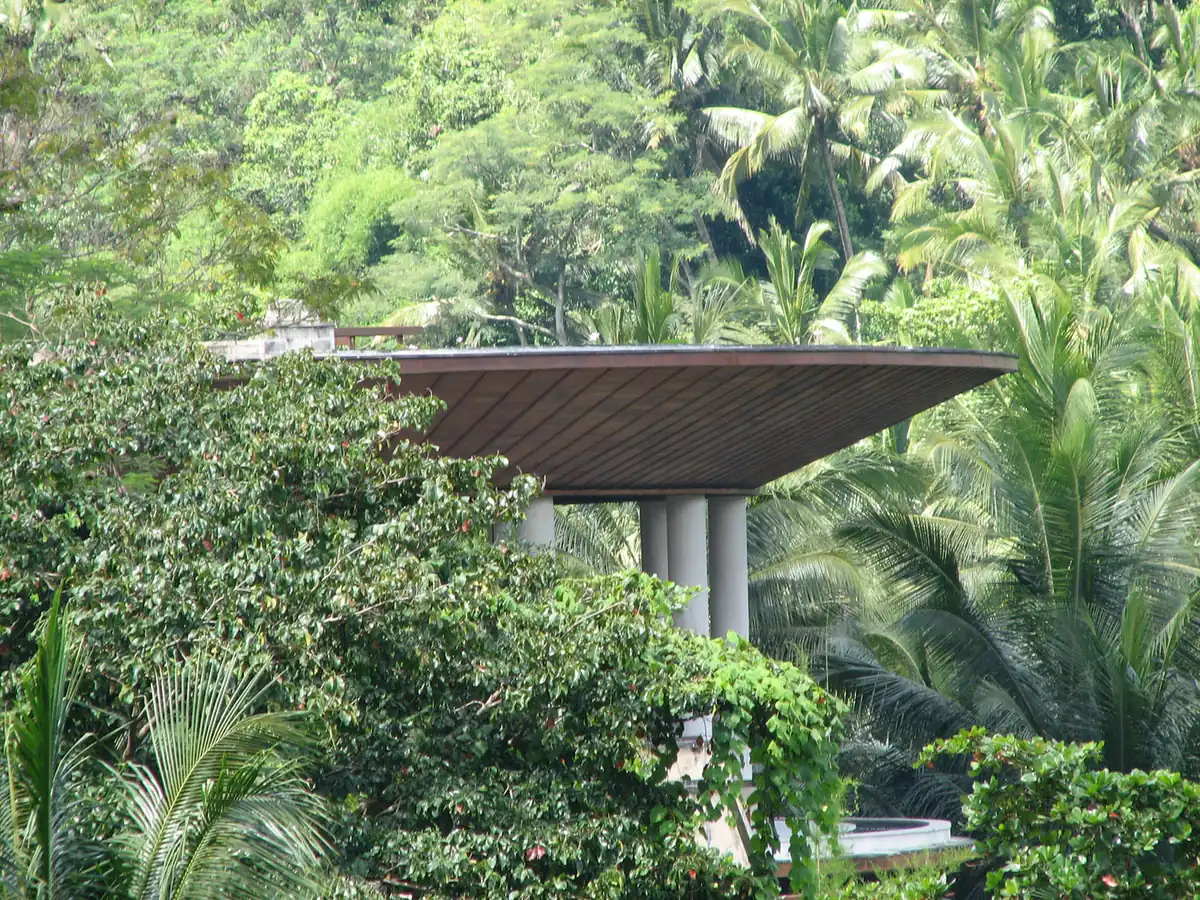 A round viewing structure above a green valley