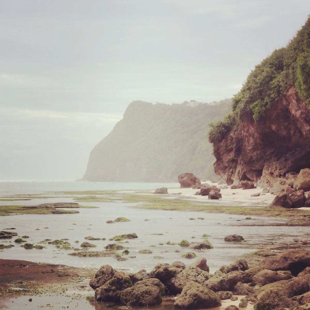A southern shore with cliffs and shallow water