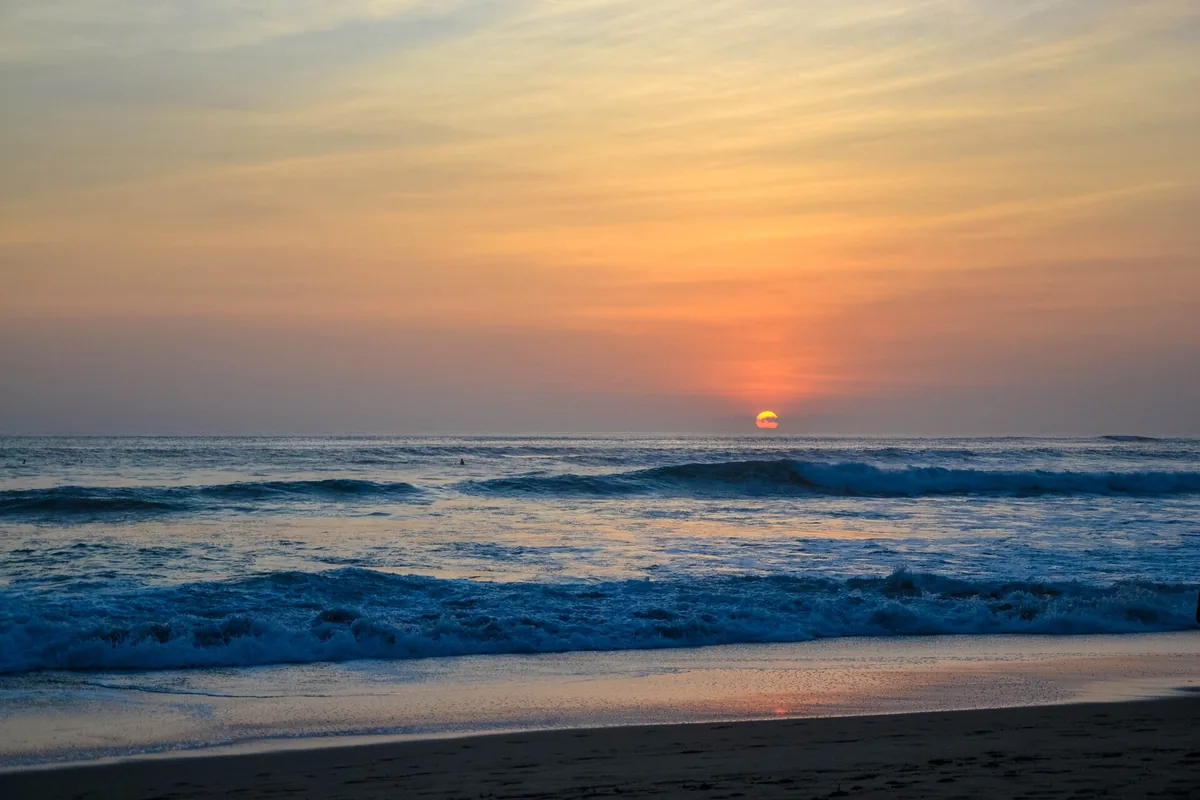 Sunset over the sea along the shoreline